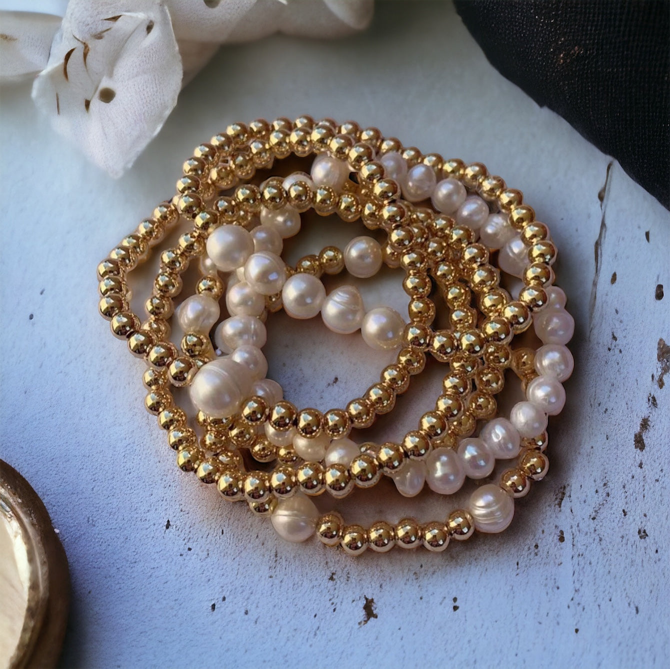 Stack of gold bracelets