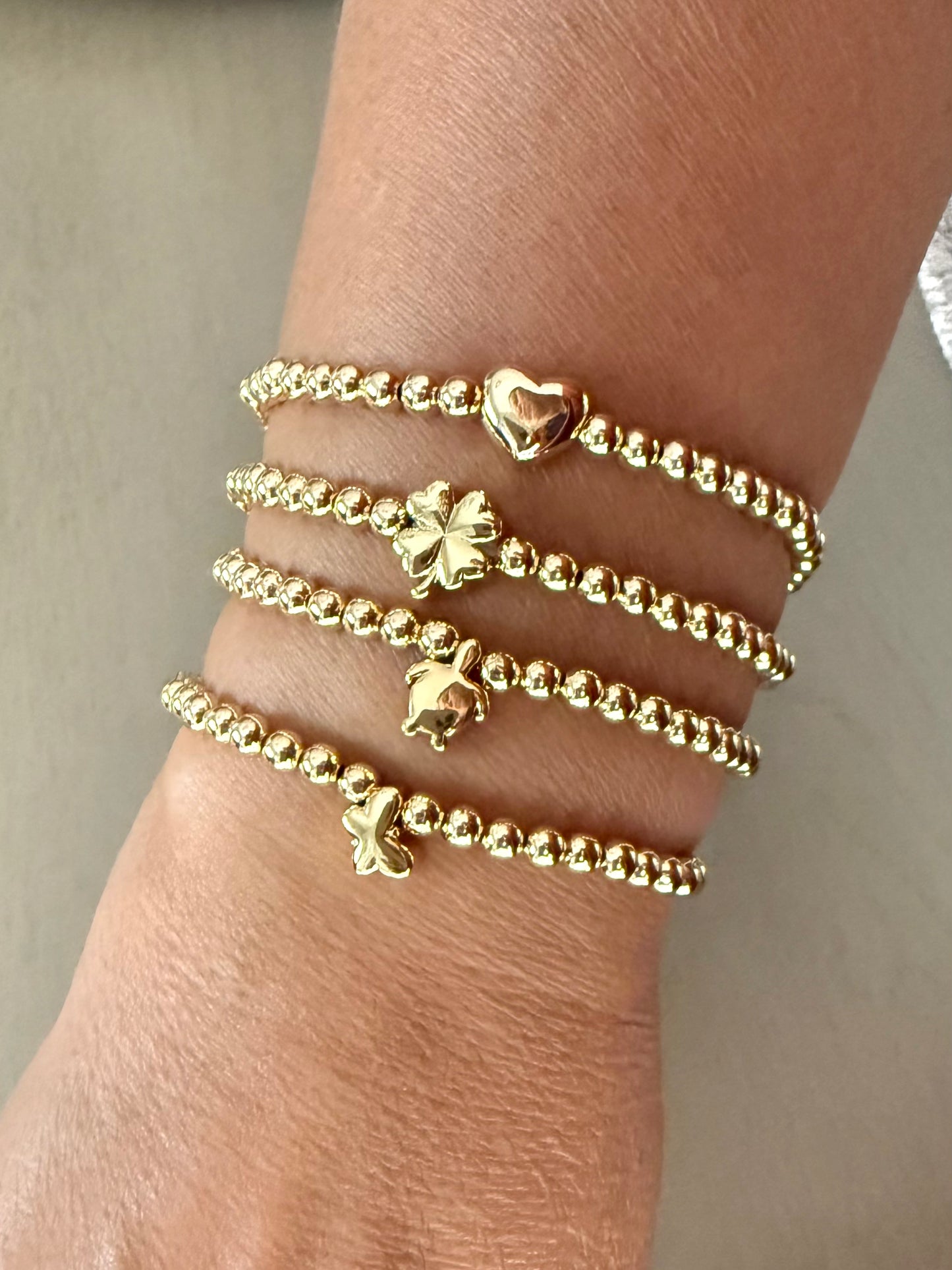 Gold Beaded Bracelet with Charms