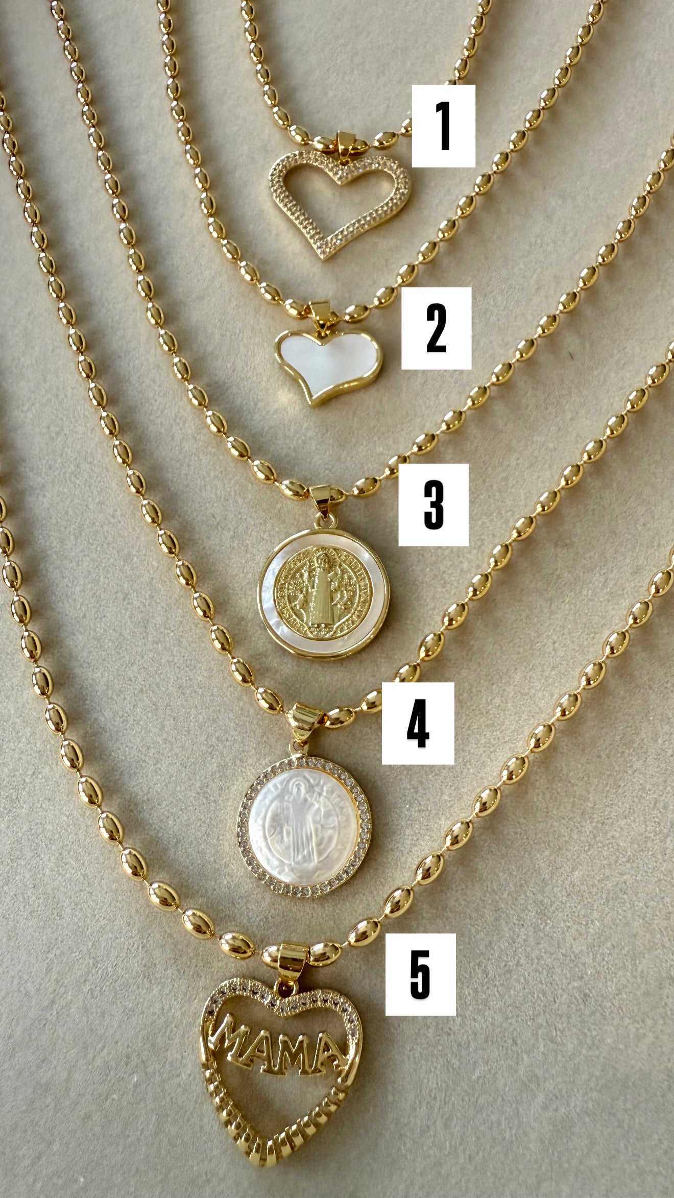 Gold necklaces with charm