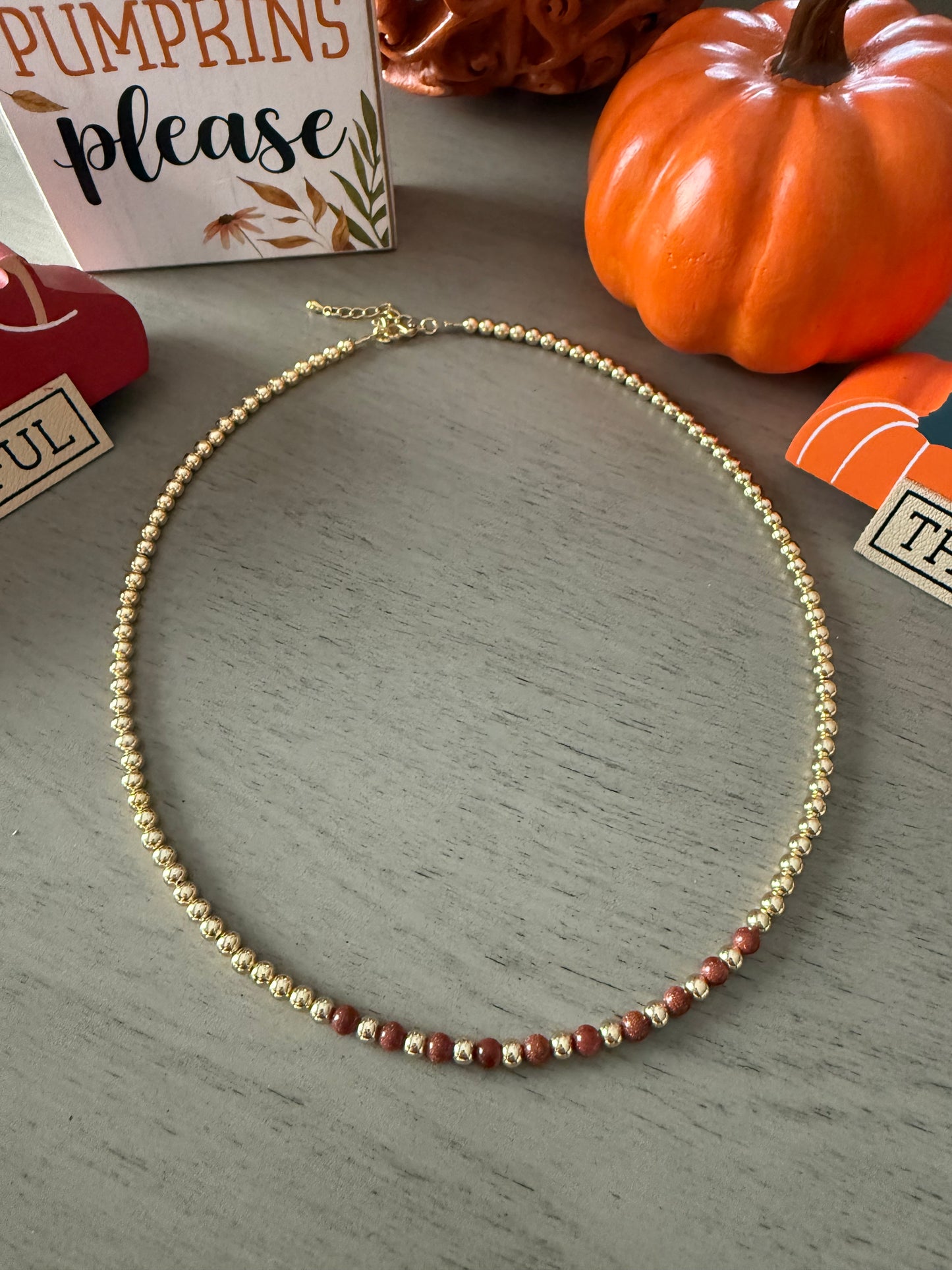 Gold Bead Necklace with Brown Stone Accents