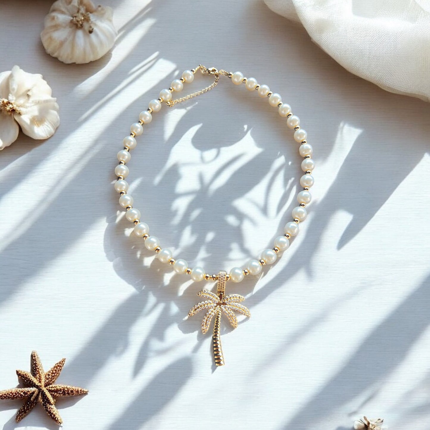 Palm tree pearl necklace