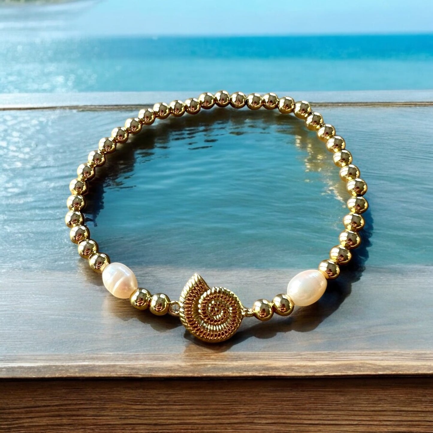 Gold shell bracelet
