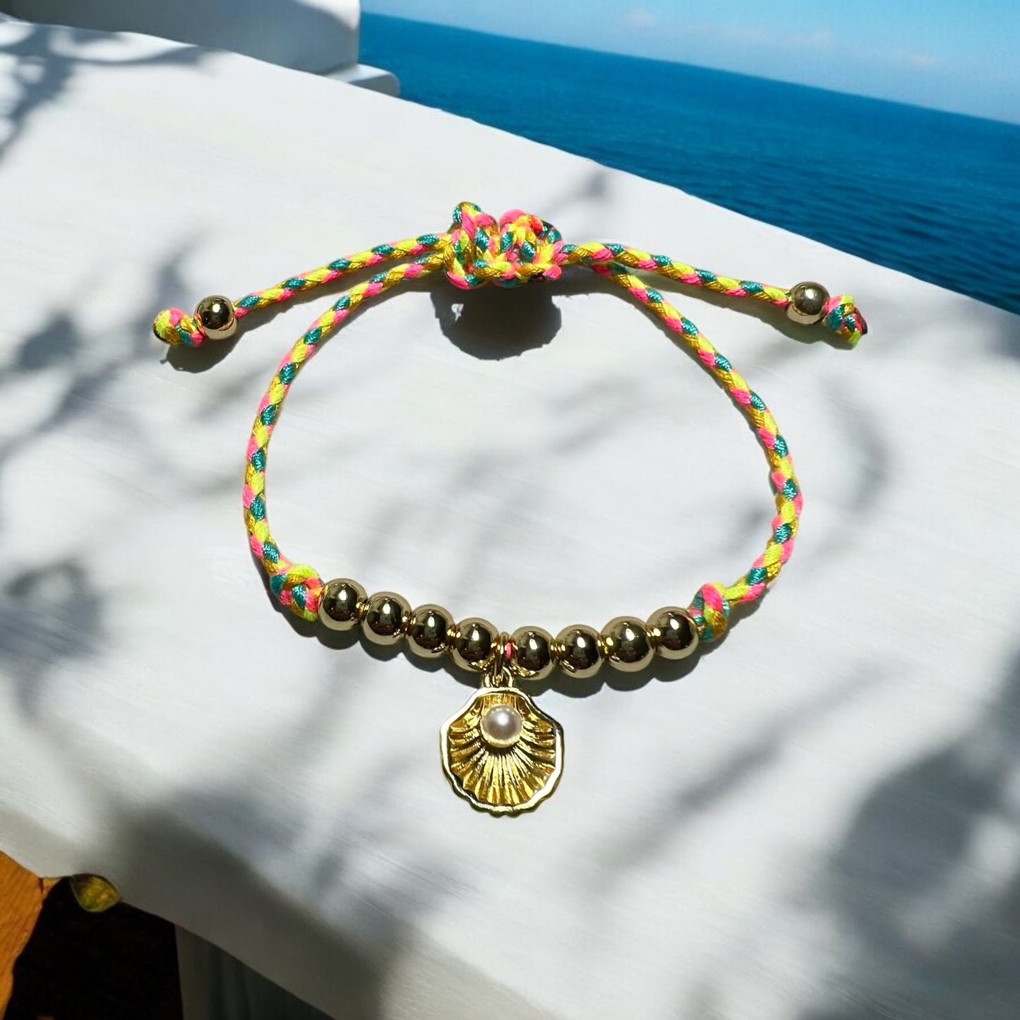 Gold shell multicolored cord
