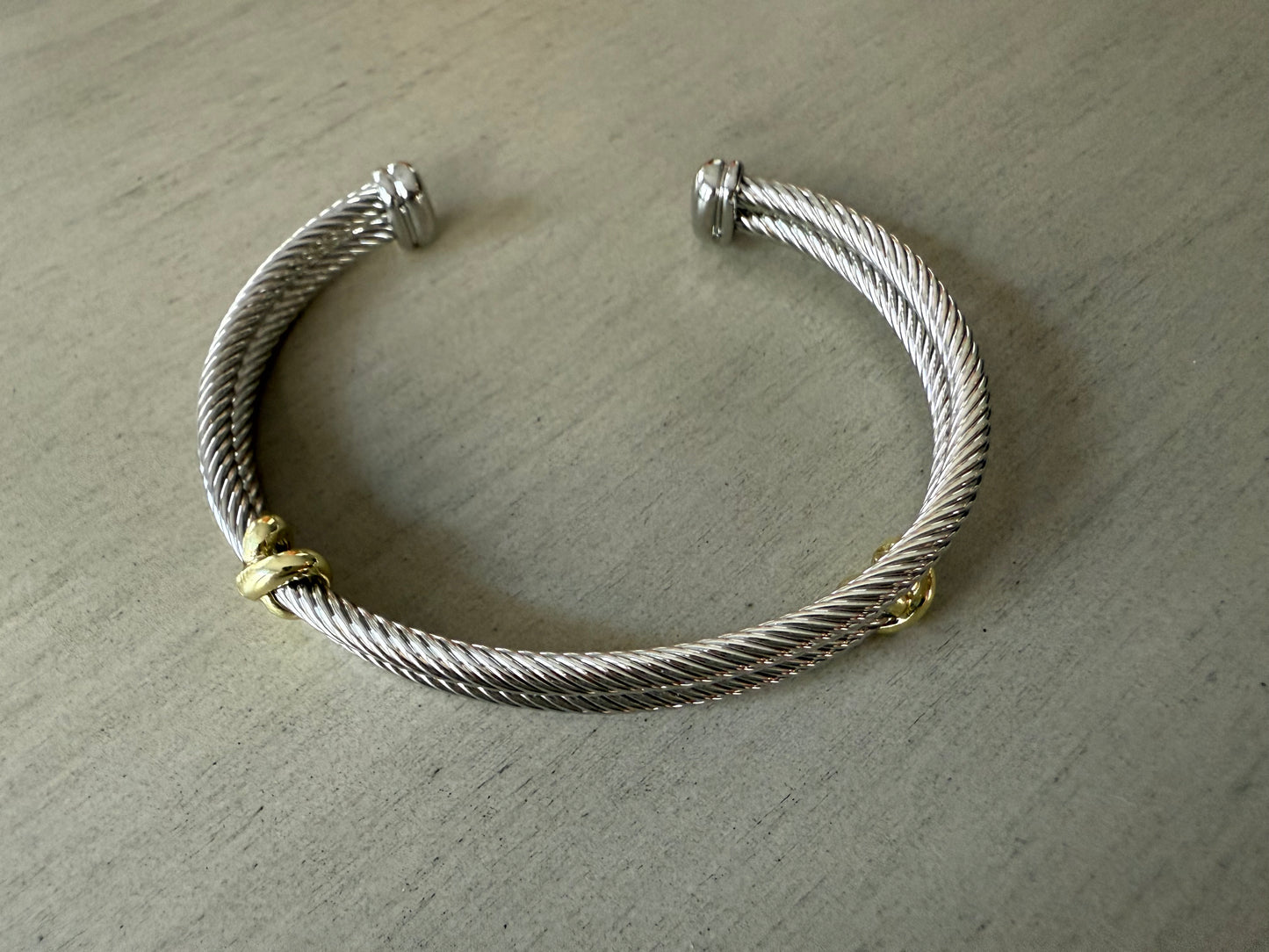 Elegant silver double bracelet with gold accents