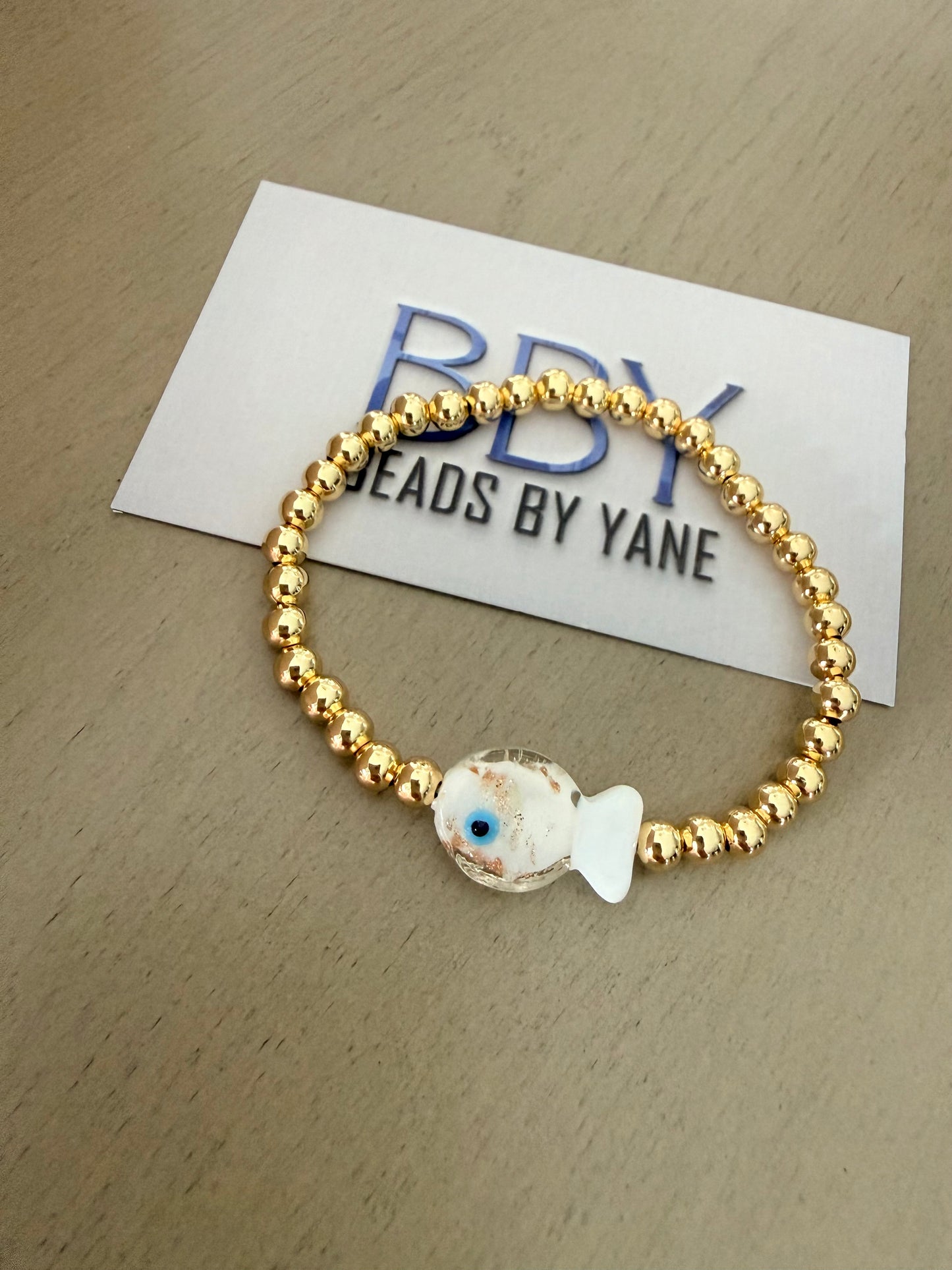 Golden Fish Charm Beaded Bracelet