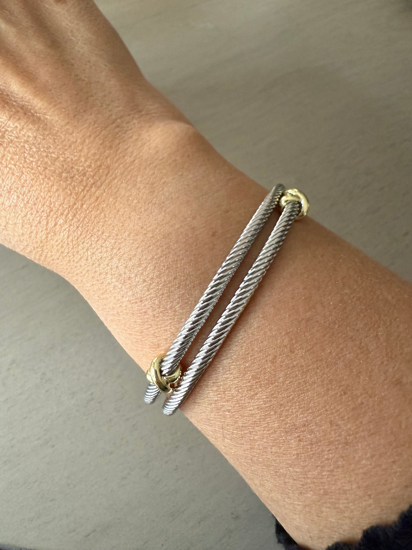 Elegant silver double bracelet with gold accents