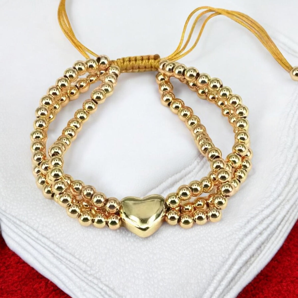 Gold adjustable bracelet with heart