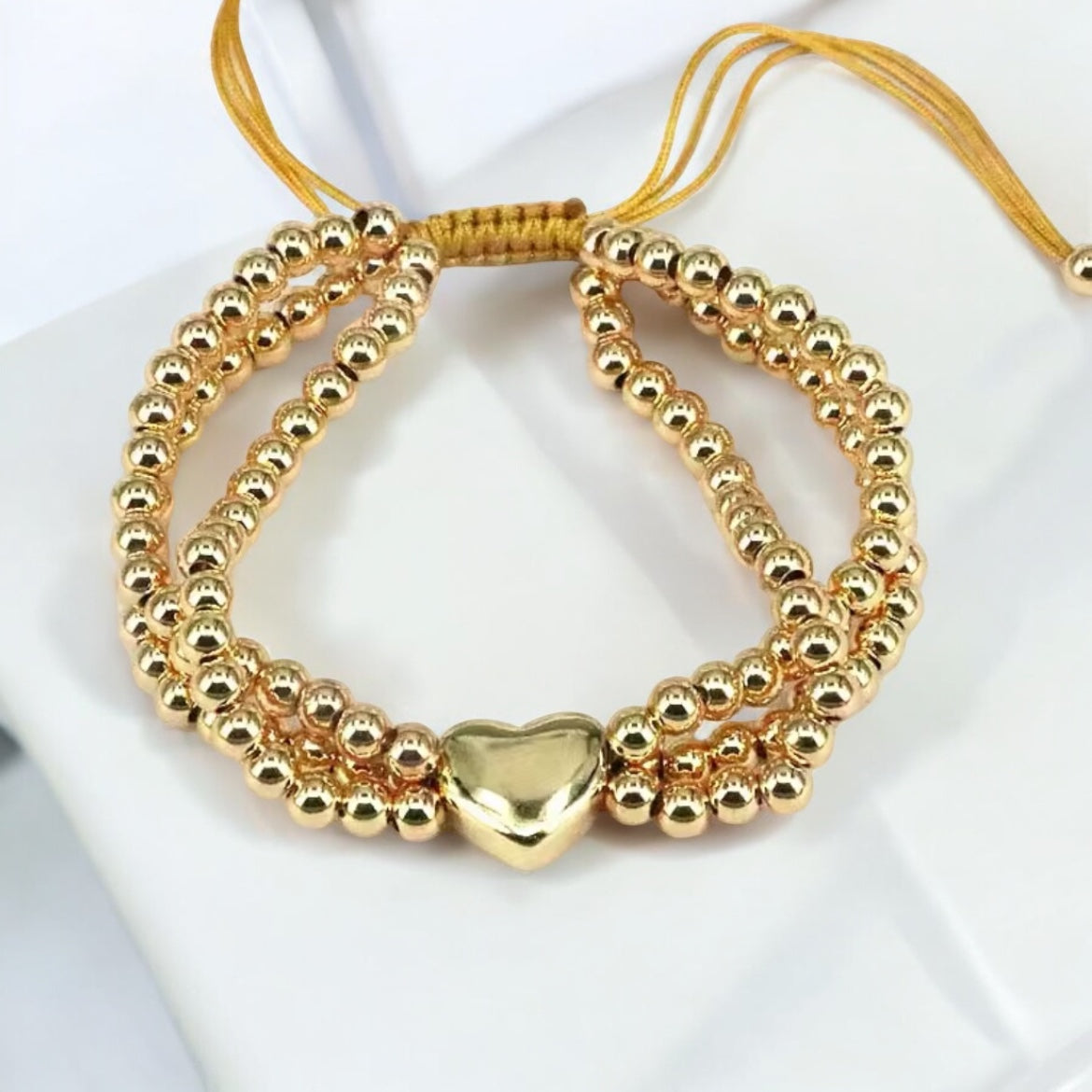 Gold adjustable bracelet with heart