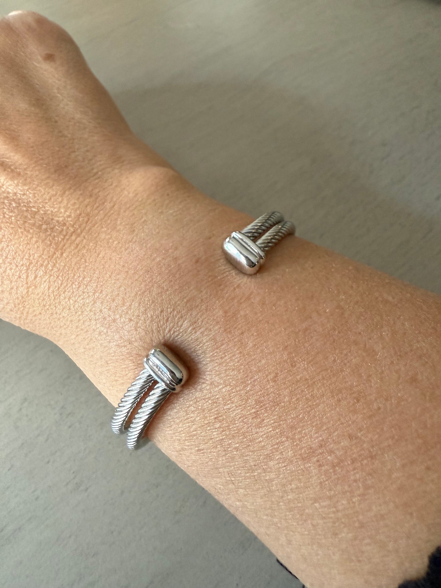 Elegant silver double bracelet with gold accents