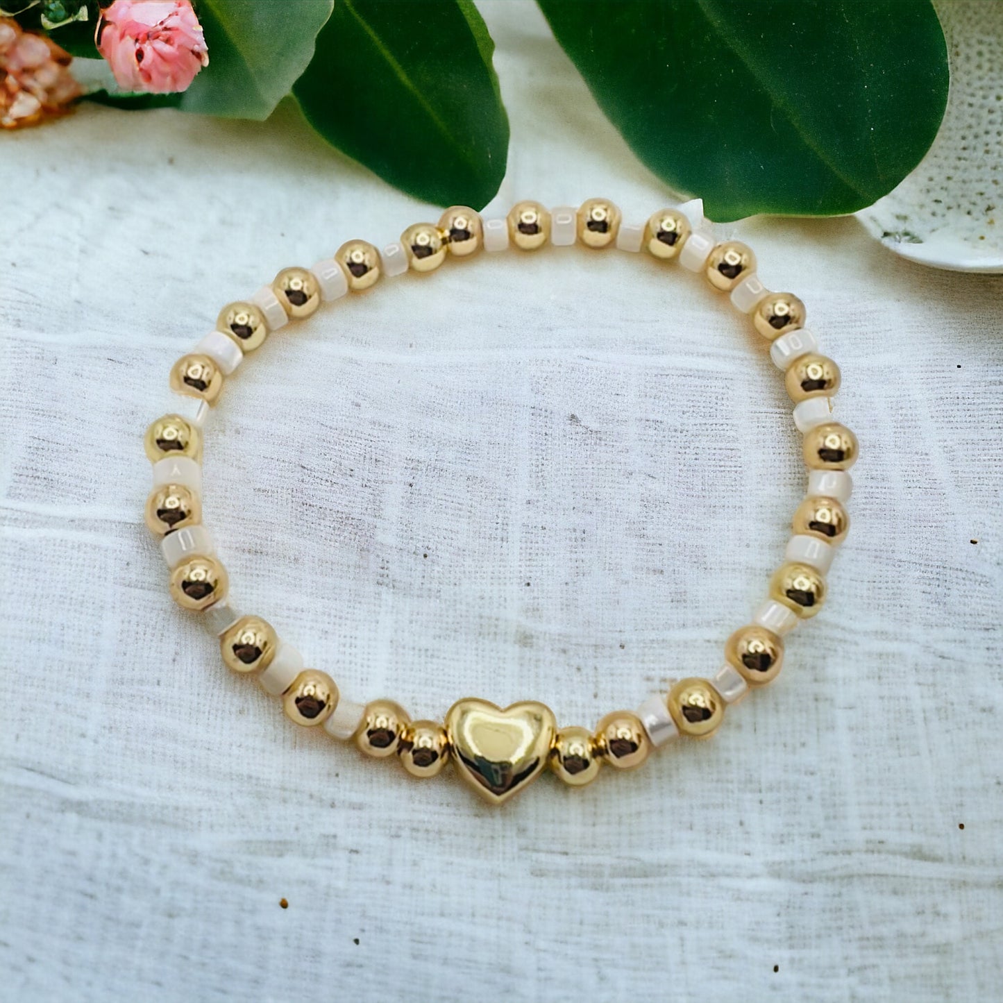 Beaded bracelet with gold heart