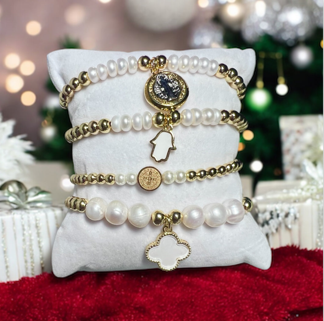 Gold and pearl bracelet with charm