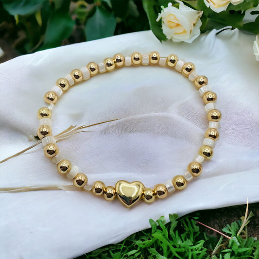 Beaded bracelet with gold heart