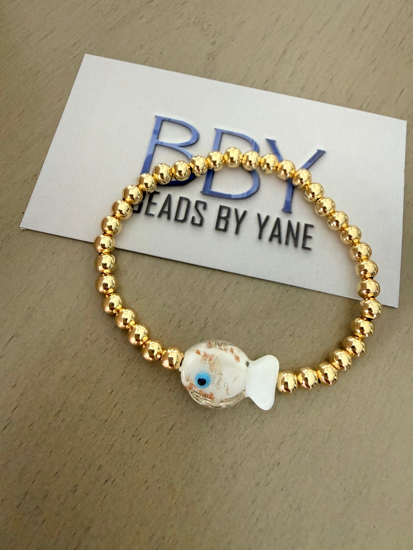 Golden Fish Charm Beaded Bracelet