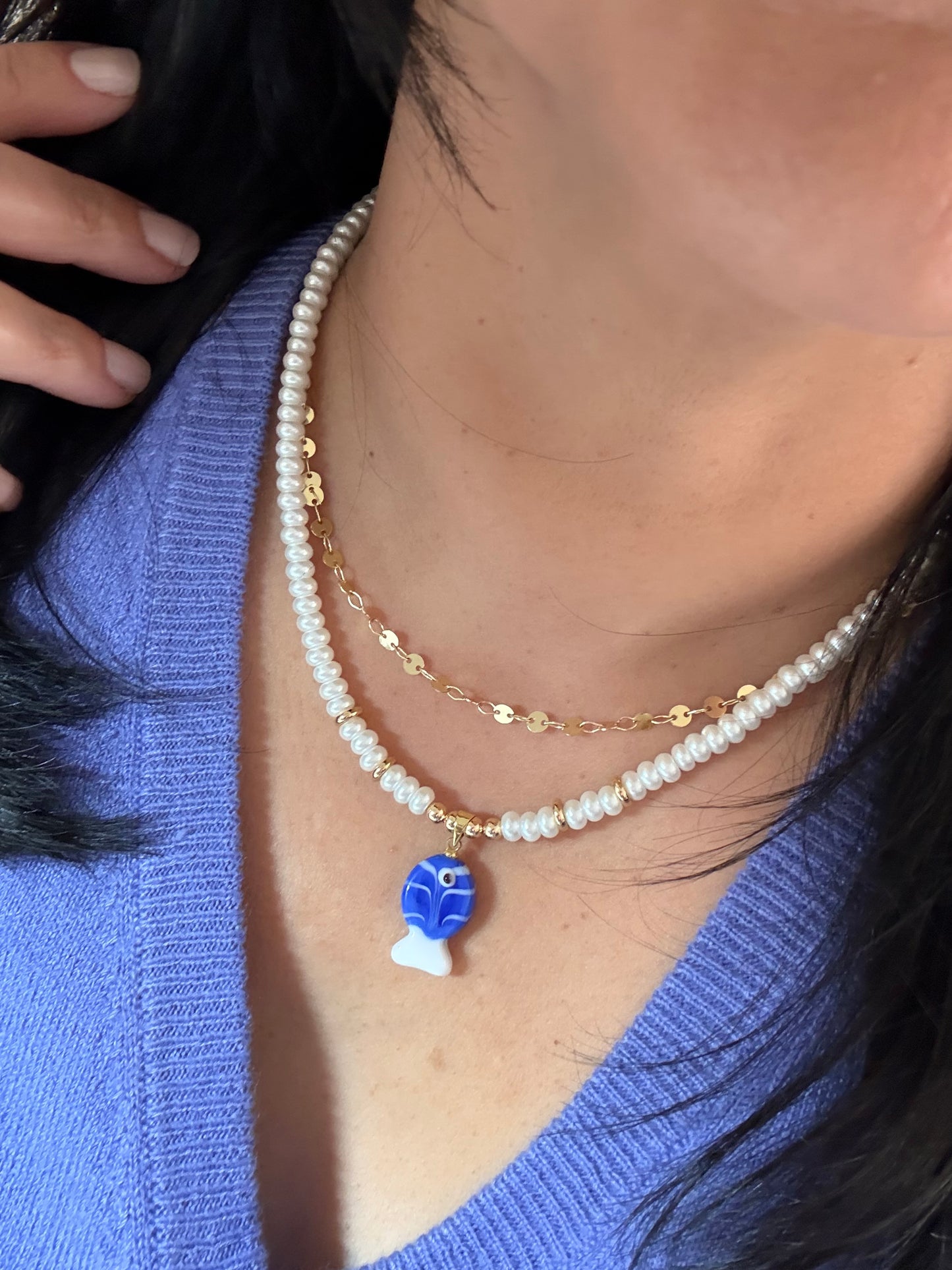 Pearl necklace with blue fish charm
