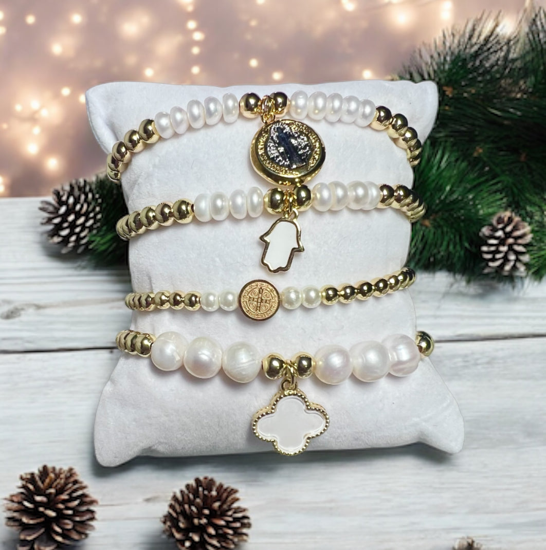 Gold and pearl bracelet with charm