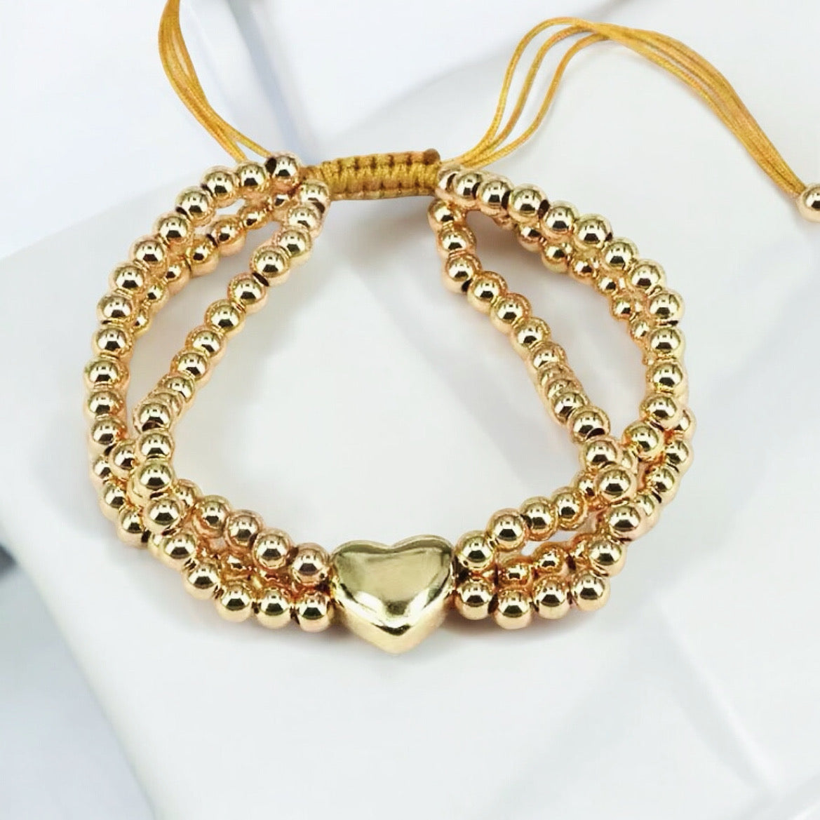 Gold adjustable bracelet with heart