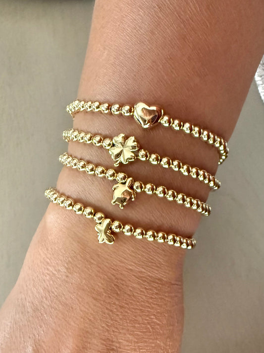 Gold Beaded Bracelet with Charms