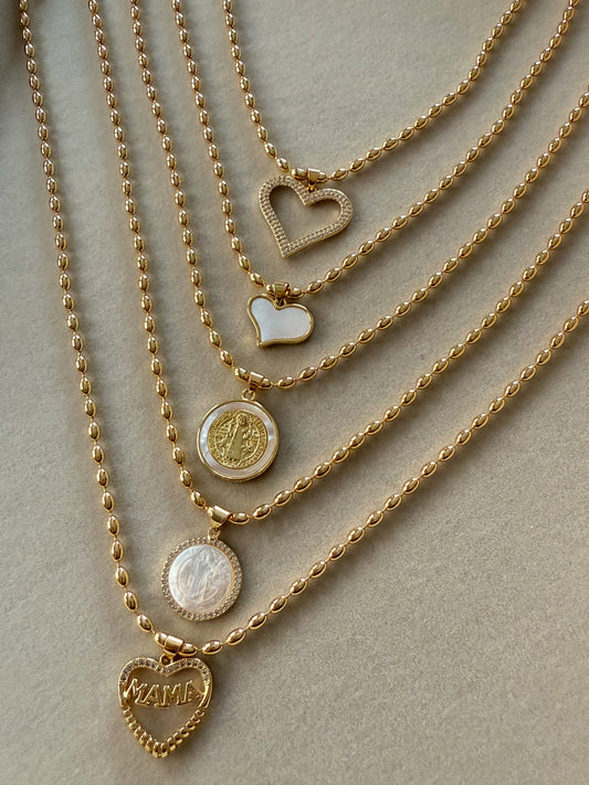 Gold necklaces with charm