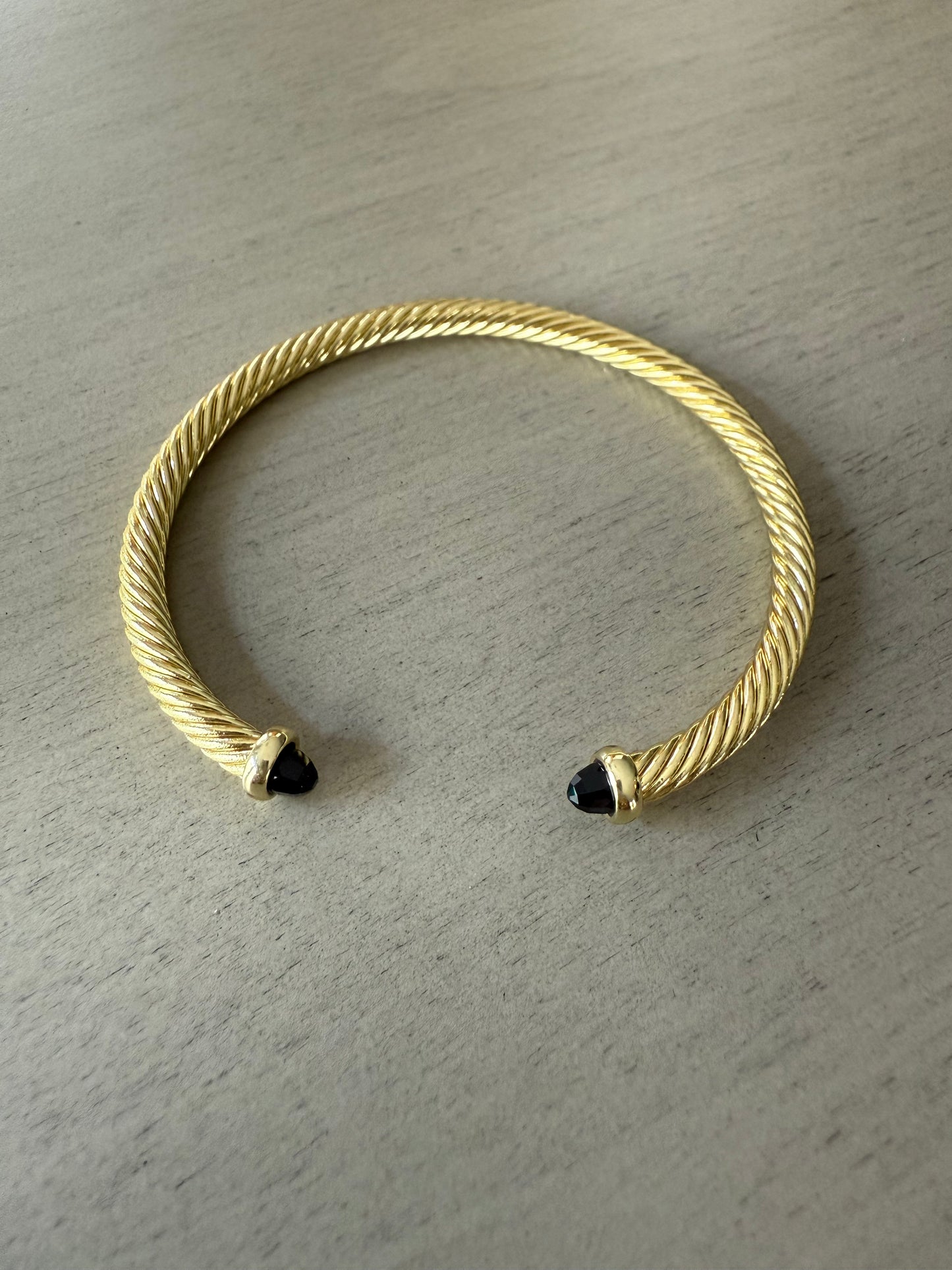 Gold Twist Cuff Bracelet with Black Stone Tips