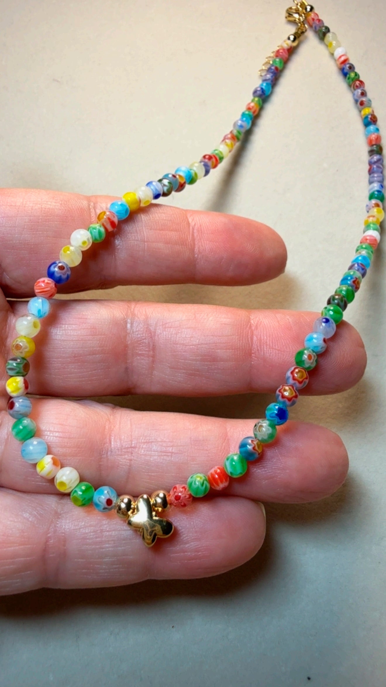 Rainbow Beaded Necklace with Gold Butterfly Charm